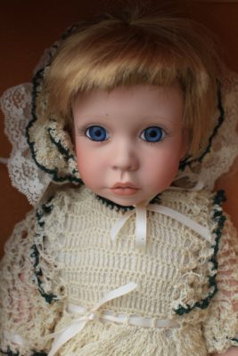 creepy-doll-with-big-blue-eyes