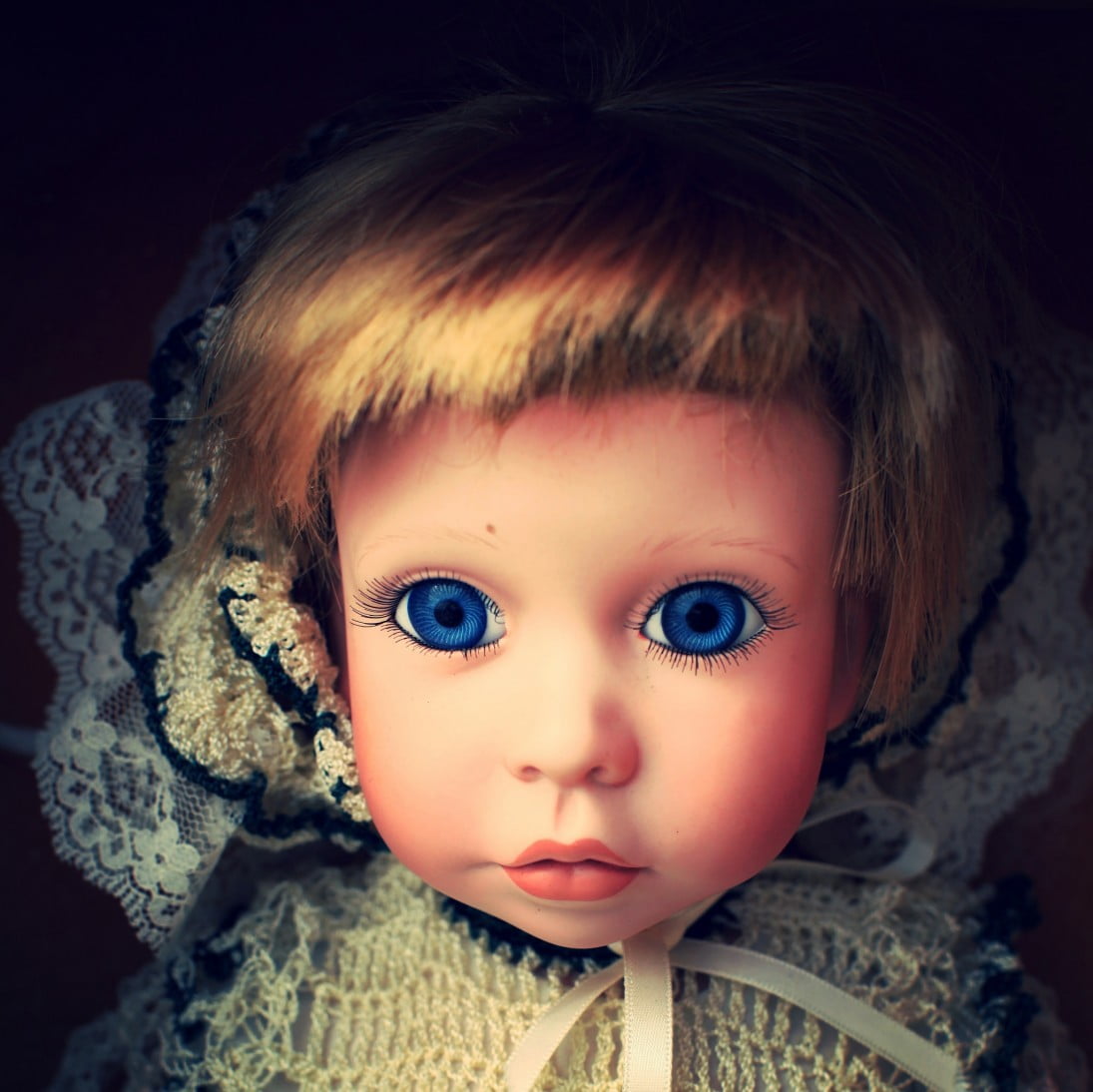 creepy doll with big eyes